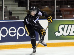 The Sarnia Sting are set to take on the London Knights on Friday night in London, and will be bolstered with the return of defenceman Josh Chapman to the line up. Chapman, who missed last week's action with an upper body injury, is pictured launching a pass up ice at Sting practice on Thursday, Jan. 23. (SHAUN BISSON, The Observer)