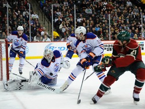 The Grove’s Ben Scrivens, shown in action here against the Minnesota Wild, has played well in net for the Oilers in his two starts but hasn’t received much offensive support as his teammates have scored twice in losses of 4-1 here and then 2-1 to the Vancouver Canucks in his latest start on Jan. 21. - Hannah Foslien, Getty Images