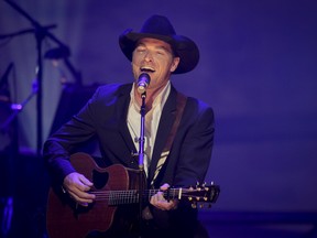 George Canyon performs during the Halo High Water benefit concert at the Southern Alberta Jubilee Auditorium in Calgary, Alta. on Monday, Aug. 4, 2013. The two-hour show featured 14 performers in a benefit for the Calgary Foundation's Flood Community Rebuilding Fund. (Lyle Aspinall/Calgary Sun/QMI Agency files)