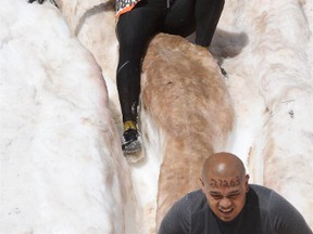 Allison Tai competing in a Tough Mudder competition. Tai was born and raised in Edmonton, Alta. She was a competitive runner and ironman triathlete before getting hit by a truck in 2006 and breaking her back, pelvis and arm. After months of recovery and rehab she now does Tough Mudder races. Photo Supplied by Tough Mudder