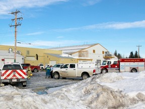 Emergency vehicles congregate at the rear of the Drayton Valley Curling Club on Jan. 24 after a portion of the roof collapsed, forcing the closure of the Omniplex and the cancellation of weekend activities at the busy facility.