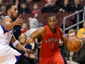Toronto Raptors guard Kyle Lowry (7) is defended by Philadelphia 76ers guard Evan Turner (12) on Jan. 24. (Howard Smith-USA TODAY Sports)