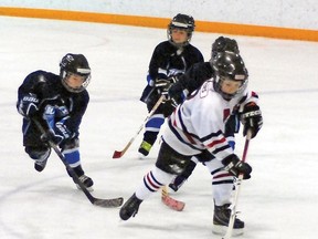 Prenovice Hawk Caden Wouters skates the puck towards the Picture Butte Blade’s zone during third period action on home ice Saturday morning. The Hawks won 14-8, and remain undefeated this season.
Simon Ducatel Vulcan Advocate