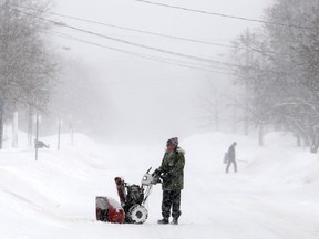 BELLEVILLE, ON (01/25/2013) Belleville residents are seen in the east end, Jan. 25, 2014, during a major major snowstorm. The storm closed highways and contributed to multiple collisions. 
EMILY MOUNTNEY/THE INTELLIGENCER/QMI AGENCY