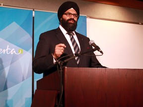 Minister of Human Services Manmeet Bhullar addresses the media on changes to the provincial child intervention system at Sterling Place, 9940 106 Street, in Edmonton, AB on Wednesday, January 8, 2014. Bhullar unveiled plans for a roundtable team to meet Jan. 28 and 29 to implement a new five-point plan to improve child care services. TREVOR ROBB/Edmonton Sun