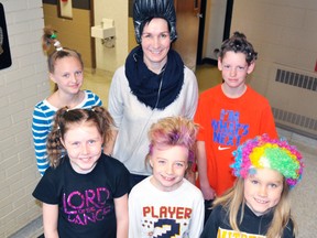 In order to combat the cold winter, students at St. Columban School tried to brighten the mood with Crazy Hair Day last Friday, Jan. 24. Pictured sporting their craziest hair were (back row, left to right): Emily Adam, Grade 7; Mrs. Angela Looby, Grade 3-4 teacher; and Zach McPhee, Grade 6. Front row (left): Samantha McCarthy, Grade 4-5; Xavier Lorentz, Grade 3-4 and Kirsten Kipfer, Grade 3. ANDY BADER/MITCHELL ADVOCATE
