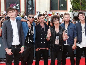 Down With Webster arrives on the red carpet for the MuchMusic Video Awards (MMVAs) in Toronto, June 16, 2013. REUTERS/Mark Blinch
