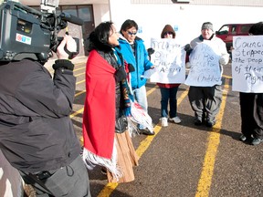 Supporters of former Piikani chief Gail Strikes With A Gun gather in front of the Peigan Band Office. Bryan Passifiume photo/QMI Agency