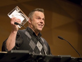 Richard Kish, director of Vigil, accepts the award for Outstanding Comedy at the Brickenden Awards at the Wolf Performance Hall on Monday. (CRAIG GLOVER/The London Free Press)