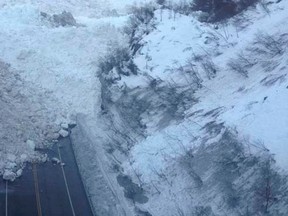 Avalanche debris is pictured on the Richardson Highway in Alaska in this January 25, 2014 handout photo.  REUTERS/Alaska Department of Transportation & Public Facilities /Handout