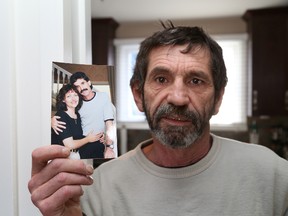 JOHN LAPPA/THE SUDBURY STAR
Marcel Gerard, of Sudbury, holds a picture of himself with his late wife, Donna.