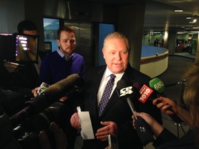 Councillor Doug Ford speaks to reporters at City Hall on Tuesday. (DON PEAT/Toronto Sun)