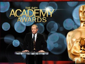 Then-Academy of Motion Picture Arts and Sciences President Tom Sherak speaks at the announcement of Academy Award nominees in Beverly Hills, California in this January 24, 2012 file photo. (REUTERS/Phil McCarten/Files)