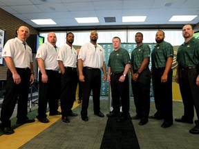 The Edmonton Eskimos introduced their coaching staff to the media at Commonwealth Stadium on Tuesday, Jan. 28, 2014 (from left) Special-teams co-ordinator Craig Dickenson, Offensive assistant Craig Davoren, Defensive backs coach Jason Shivers, Offensive co-ordinator Steve McAdoo, Head coach and Defensive Chris Jones, Receivers coach Kez McCorvey, Quarterbacks coach/passing game co-ordinator Jarious Jackson and Defensive line coach Ed Philion. (Perry Mah, Edmonton Eskimos)