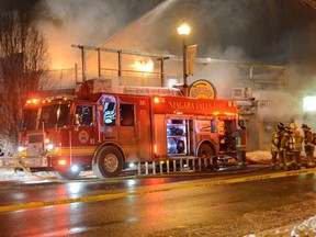 Firefighters battle a blaze in a tourist area of Niagara Falls. (Andrew Collins Photo)