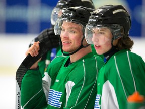 Max Domi and Mitch Marner of the Knights watch their teammates in a defensive drill at the Western Fair Sports Centre in London, Ont. on Tuesday January 28, 2014. 
Mike Hensen/The London Free Press/QMI Agency