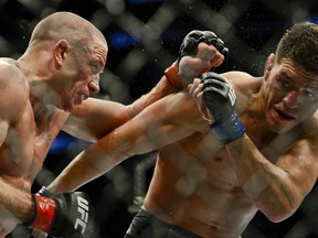 GSP probably won't be fighting, but the UFC will hit a record five Canadian cities in 2014. (MARTIN CHEVALIER/QMI Agency)