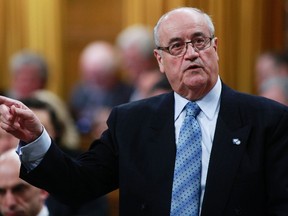 Minister of Veterans Affairs Julian Fantino speaks during Question Period on Parliament Hill in Ottawa January 29, 2014. (REUTERS/Blair Gable)