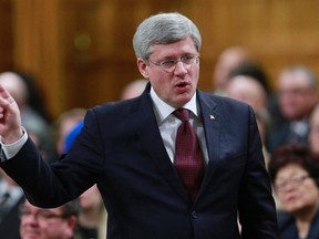 Canada's Prime Minister Stephen Harper speaks during Question Period on Parliament Hill in Ottawa January 29, 2014. (REUTERS/Blair Gable)