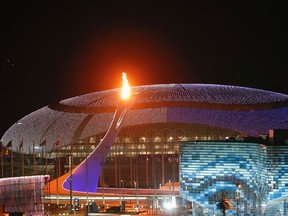 The Olympic flame is tested Thursday in its cauldron in front of the Bolshoy Ice Dome on the Olympic Park as preparations continue for the Sochi 2014 Winter Olympics. The opening ceremony for the winter games will be held Feb. 7. (REUTERS/Fabrizio Bensch)