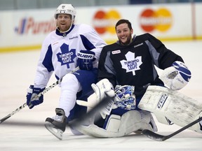 Sharing a laugh with teammate Phil Kessel on Wednesday in Etobicoke, Jonathan Bernier (right) appears to have snatched the Maple Leafs starter’s role from James Reimer. (Dave Abel/Toronto Sun)