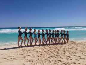 The Bluewater Gymnastics Club recently saw a large group of girls see success at the Cancun Classic in Mexico. The squad is pictured above on the beach in Cancun, where they competed and trained from Jan. 16 to 23.  (Submitted photo)