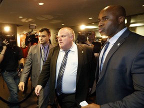 Toronto Mayor Rob Ford leaves his City Hall office on Wednesday, January 29, 2014. (Michael Peake/Toronto Sun)