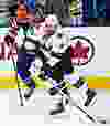Edmonton's Anton Belov (77) pursues San Jose's Martin Havlat (9) during the third period of the Edmonton Oilers' NHL hockey game against the San Jose Sharks at Rexall Place in Edmonton, Alta., on Wednesday, Jan. 29, 2014. The Oilers won 3-0. Codie McLachlan/Edmonton Sun/QMI Agency
