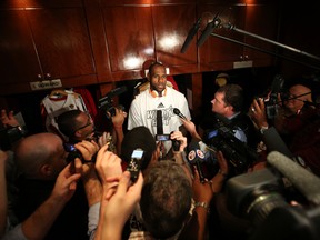 Miami Heat's LeBron James addresses the media prior to playing the San Antonio Spurs in Game 2 of the 2013 NBA Finals on June 9, 2013. (Nathaniel S. Butler/NBAE via Getty Images/AFP)