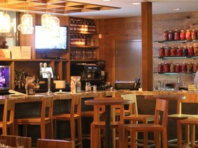 Dolcetto's warm wood decor and open concept dining room make for a cozy space to enjoy a meal.