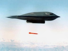 An undated file picture shows a B-2 Spirit Bomber dropping a B61-11 bomb casing from an undisclosed location. (AFP PHOTO/HO-DOD)