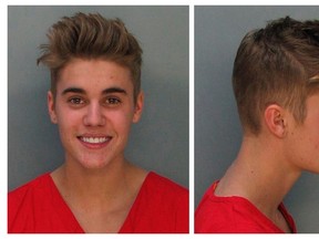 Canadian teen pop singer Justin Bieber is shown in this combo of booking photos provided by the Miami-Dade Corrections and Rehabilitation Department in Miami, Florida January 23, 2014. (REUTERS/Miami-Dade Corrections and Rehabilitation Department/Handout via Reuters)
