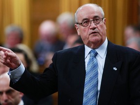 Minister of Veterans Affairs Julian Fantino speaks during question period on Parliament Hill in Ottawa January 29, 2014. (REUTERS/Blair Gable)