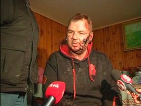 Dmytro Bulatov, 35, one of the leaders of anti-government protest motorcades called 'Automaidan', speaks to journalists after being found near Kiev in a still image from footage obtained by Reuters TV January 30, 2014. (REUTERS/Handout via Reuters TV)