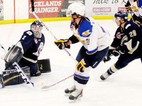 The Oil Barons Zach Wittenberg got the perfect pass and made the perfect tip up high over Saints goaltender Kenny Cameron’s blocker hand to score the winning goal in his team’s 3-1 win over the Saints. Two wins by the Barons and two losses by the Saints saw the teams change position in the standings. - Gord Montgomery, Reporter/Examiner