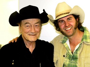 Tim Hus (right) will perform a concert in remembrance of Canadian icon Stompin’ Tom Connors (left) at the Early Stage Saloon in Stony Plain on Feb. 7 at 8:30 p.m. - Photo Supplied