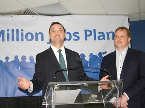 Ontario Opposition Leader Tim Hudak visited St. Thomas on Friday to promote his Million Jobs Act. He said the proposed private member's bill won't include right-to-work provisions but labour legislation reform remains a priority. He's joined by Elgin-Middlesex-London PC MPP Jeff Yurek. Eric Bunnell/Times-Journal