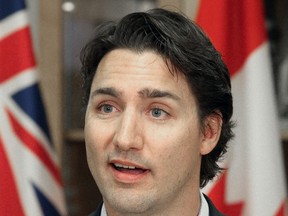 Federal Leader Justin Trudeau and Ontario Premier Kathleen Wynne joined Niagara Falls byelection candidate Joyce Morocco for a tour at Michael's Catholic High School in Niagara Falls Friday, Jan. 17, 2014 (Mike DiBattista/QMI Agency)