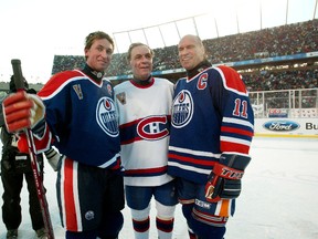 Wayne Gretzky and Mark Messier flank Montreal Canadiens great Guy Lafleur after the 2003 Legends Game at the Commonwealth Stadium. The next game played was the 2003 Heritage Classic between the Edmonton Oilers and Montreal Canadiens. It was the NHL’s first-ever outdoor regular season game.