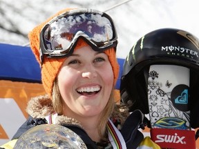 Canada's Sarah Burke holds the crystal cup after winning the Ladies' halfpipe freestyle FIS World Cup Grand Finals in Chiesa Valmalenco in March 12, 2008. Burke, 29, died Jan. 19, 2012, nine days after an injury during a training session in Park City, Utah. (REUTERS/Max Rossi)