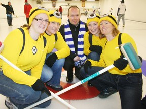 Newman Minions team members Heather Brekelmans, Melody Newman, Steve Crisps (manager), Joann Newman and Cathy Angehrn dressed as minions from the movie Despicable Me for the 10th annual Big Brothers and Big Sisters of Ingersoll, Tillsonburg and Area Curl for Kids' Sake fundraiser at the Ingersoll and District Curling Club on Saturday, Feb. 1, 2014. (Postmedia News file photo)