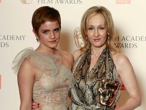 Author J.K. Rowling (R) and actress Emma Watson pose after Rowling received an award for outstanding contribution to British cinema at the British Academy of Film and Television Arts (BAFTA) award ceremony at the Royal Opera House in London, Feb. 13, 2011. REUTERS/Luke Macgregor