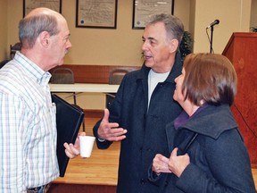 Vulcan’s development officer Jeff Johnstone, left, chats with Alcide and Linda Cloutier Jan. 24 at the Vulcan Lodge Hall following an informational meeting about the proposed assisted living facility for Vulcan.  
Simon Ducatel Vulcan Advocate