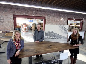 From left, Jodi Scholten, Jacob Bisschop and Damaris Bisschop are thrilled with Flooring Canada’s newly-renovated 10,000 square-foot location at 163 Tillson Ave., the former Norfolk Leaf tobacco warehouse. The business celebrated its grand opening Thursday evening.