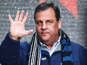 New Jersey Governor Chris Christie waves to guests as he attends the Super Bowl Hand-Off Ceremony at the Boulevard fan zone ahead of Super Bowl XLVIII in New York February 1, 2014. REUTERS/Eduardo Munoz