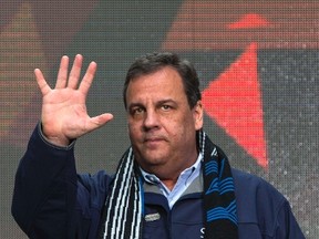 New Jersey Governor Chris Christie arrives on stage during the Super Bowl Hand-Off Ceremony on Super Bowl Boulevard in Times Square as part of the Super Bowl lead up in New York  February 1, 2014. REUTERS/Andrew Kelly