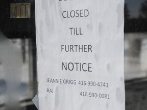 A sign taped to the front door of The Bel Marine Retirement Residence advises visitors the facility is closed. An inspector with the Electrical Safety Authority identified a number of concerns at the Dundas Street East facility.