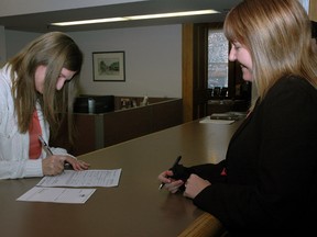 St. Thomas Mayor Heather Jackson, right, filed her nomination papers Monday morning with Melanie Knapp at the city clerk's department. Jackson is the first out of the gate to officially declare her intention in the fall October municipal vote.