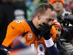 Denver Broncs' QB Peyton Manning leaves the field after losing to the Seattle Seahawks.