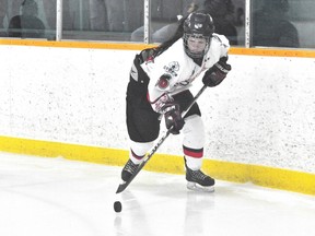 Caps forward Taylor Boehlig handles the puck during a 2-0 loss to Pembina Valley Feb. 3. (Kevin Hirschfield/THE GRAPHIC/QMI AGENCY)